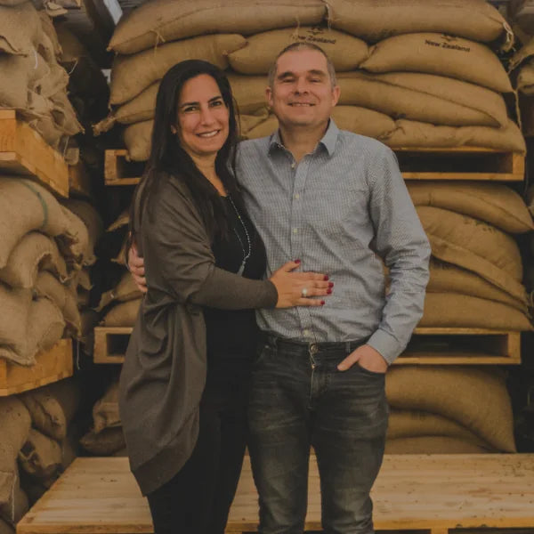 Smiling café owner, real partnership