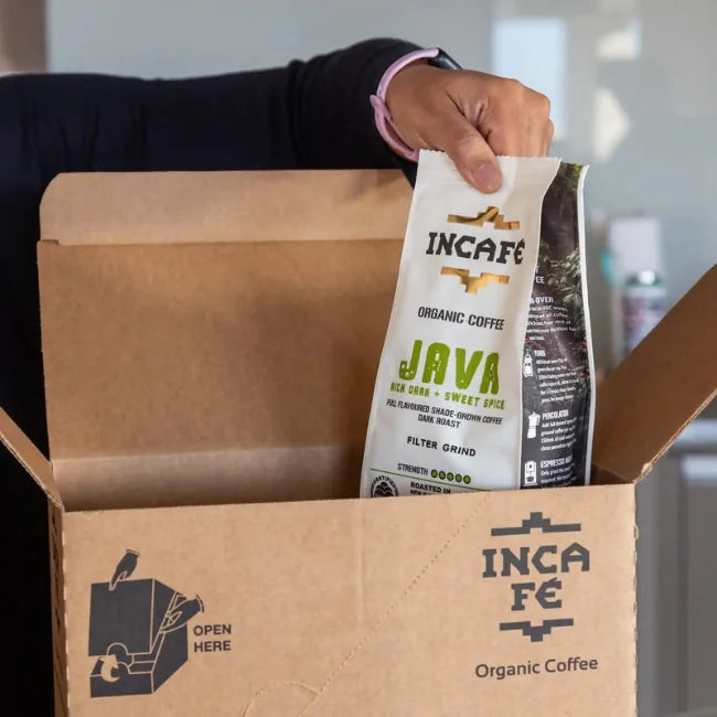 IncaFé organic coffee subscription delivery box at a front door