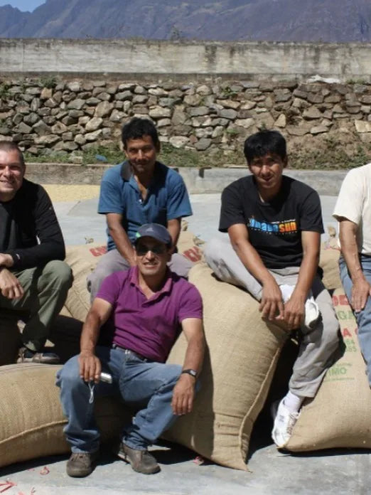 Joop with origin partners at a coffee drying patio